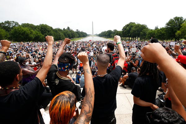 Demonstrators protested Saturday, June 6, 2020, at the Lincoln Memorial in Washington.