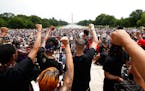 Demonstrators protested Saturday, June 6, 2020, at the Lincoln Memorial in Washington.