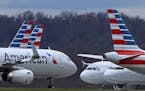American Airlines planes were parked at Pittsburgh International Airport in Imperial, Pa.
