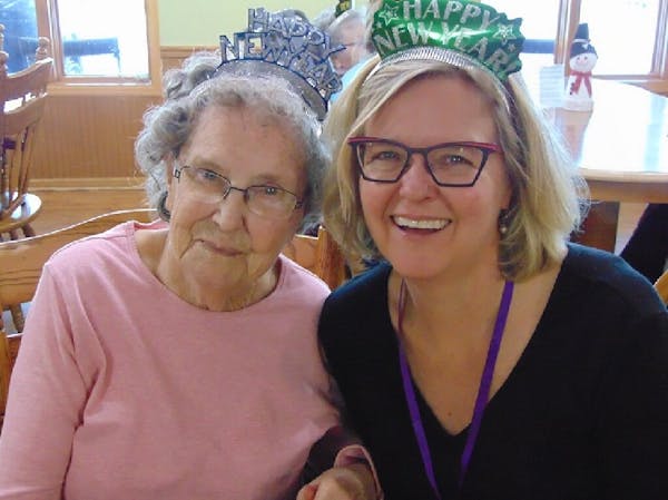 Gladys Falk, left, with her daughter Candace Falk during a visit to her senior home. Gladys Falk died COVID-19 on June 2.
