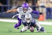 Vikings cornerback Mike Hughes stopped a pass intended for Dallas wide receiver Michael Gallup