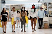 The Mall of America opened again for the first time since mid-March, where most shoppers wore face masks Wednesday.