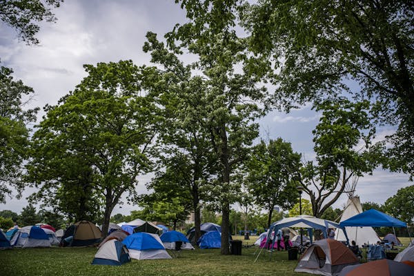 A survey found 560 tents in Powderhorn Park, but about 282 campers; people use extra tents for their belongings, a survey found.
