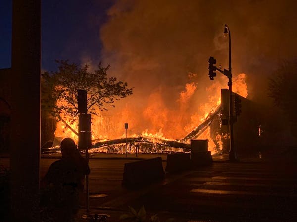 A fire engulfed the Max It Pawn shop on Lake Street and 28th Street on May 28, 2020.