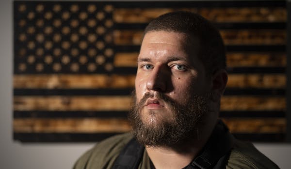 Michael Solomon, an adherent of the anti-government Boogaloo Bois movement, calls himself an “armed redneck.”