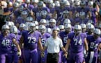 In this Sept. 27, 2014, file photo, St. Thomas coach Glen Caruso leads his team onto the field