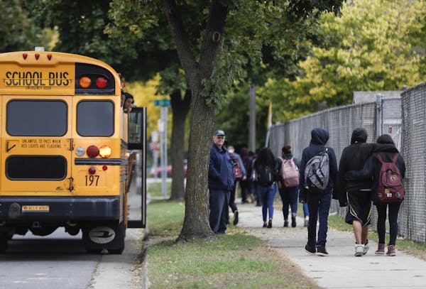 Students walked to buses and home from school at the end of the school day at South High School in Minneapolis, Minn., on Monday, October 9, 2017.
