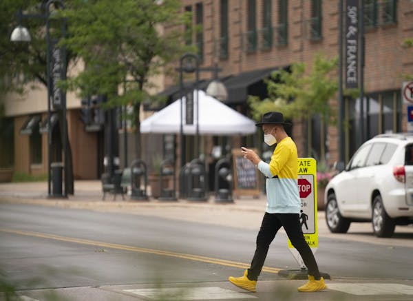 Some shoppers and diners were out at 50th and France in Edina on June 29.
