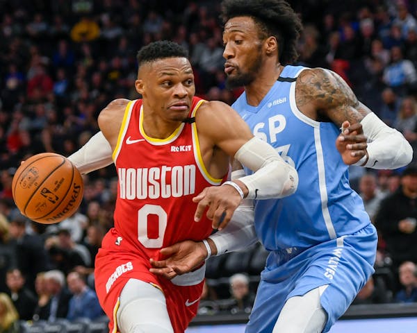 Houston guard Russell Westbrook drives past Timberwolves guard Jarrett Culver during the second half