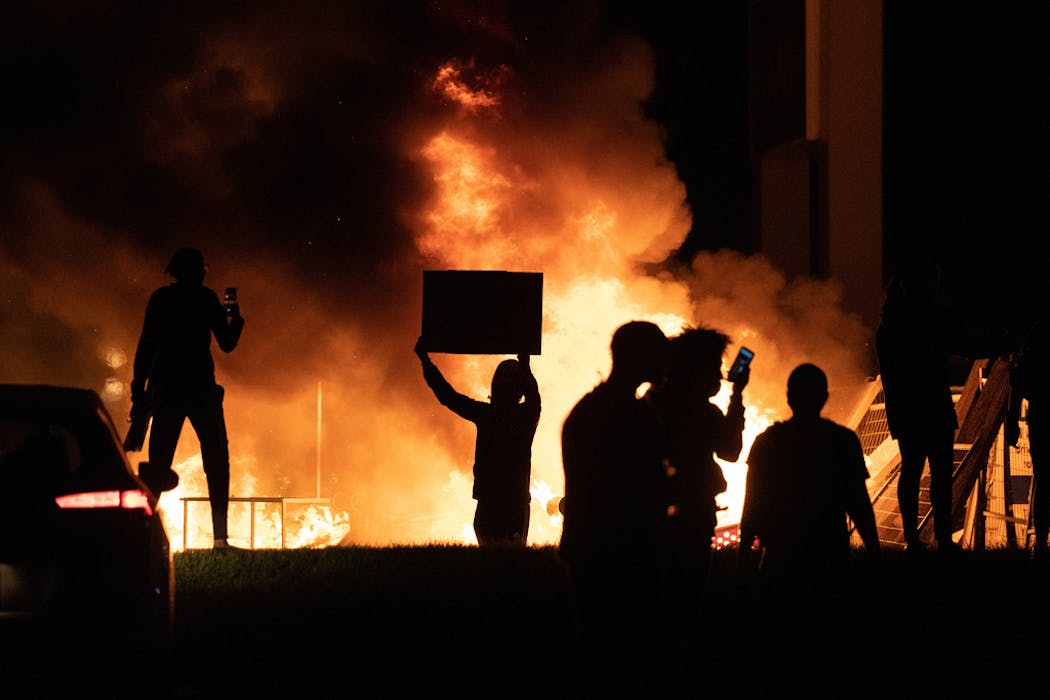 Rioters set fire to the AutoZone near Lake Street and 27th Ave. S. on May 27.