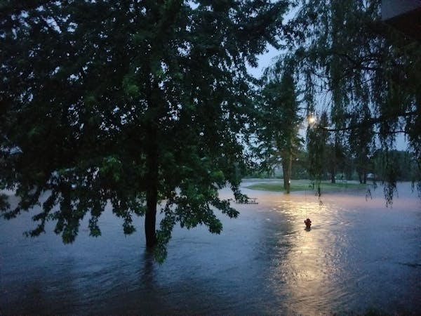 Flood waters overtook the intersection of 12th and Florence Street in Baldwin, Wis. in the early hours of June 29.