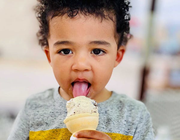 Malaki Beale, age 2, of Minneapolis, enjoys his favorite summer treat.