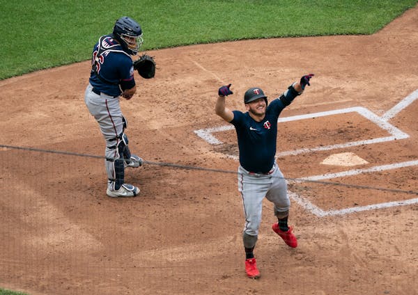 Twins third baseman Josh Donaldson celebrated after hitting a home run in a scrimmage at Target Field on July 9