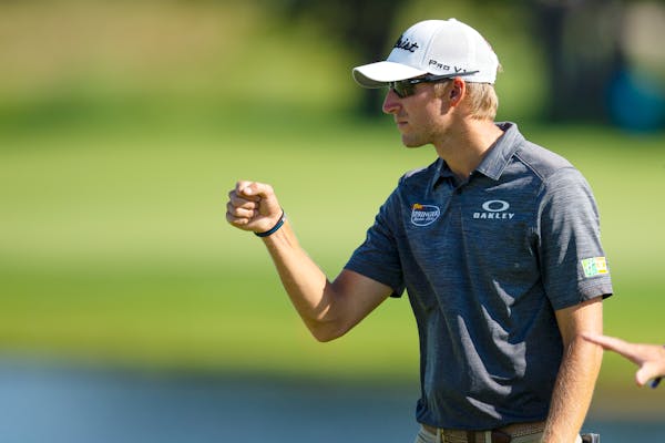 Richy Werenski celebrates after a birdie on the 18th hole to give him the lead of the during the first round of the 3M Open
