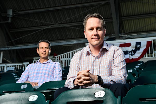 Twins Chief Baseball Officer Derek Falvey, right, and General Manager Thad Levine will determine what deals the team makes.
