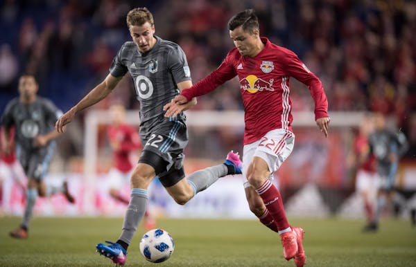 The Loons’ Wyatt Omsberg, left, battled for the ball with New York Red Bulls’ Florian Valot earlier this season.