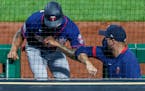 Byron Buxton was greeted after scoring a run in Wednesday's game at Pittsburgh.