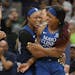 Minnesota Lynx guard Odyssey Sims (1) celebrated with guard Lexie Brown (4) during a game las season.