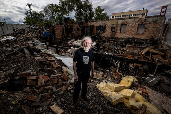 Don Blyly stood on the ruins of Uncle Hugo's Science Fiction & Uncle Edgar's Mystery Bookstores on S. Chicago Avenue in Minneapolis on Wednesday.