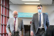 Former Minneapolis police officer Thomas Lane, right, entered the Hennepin County Public Safety Facility with his attorney Earl Gray, left, for a June