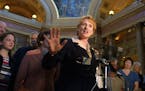 St. Paul, MN thursday 6/28/2001 House member Rep. Betty Folliard appeared before cameras and microphones outside the house chamber to accuse some memb