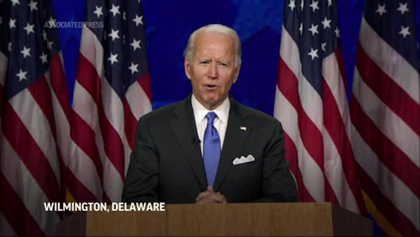 Biden vows to unite Americans and end 'darkness'