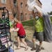 Students began moving into dormitories at Minnesota State University-Mankato Thursday where parents Ryan and Karen Ellenbecker moved the belongings of