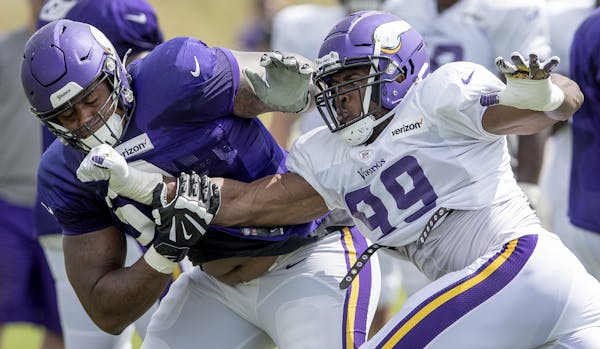 Training camp may look differently than last year for Rashod Hill and Danielle Hunter.