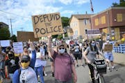 Hundreds of protesters gathered outside the Minneapolis Police Union headquarters in June.