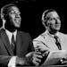 Elgin Baylor signed with the Lakers, and team president Bob Short, in 1958.