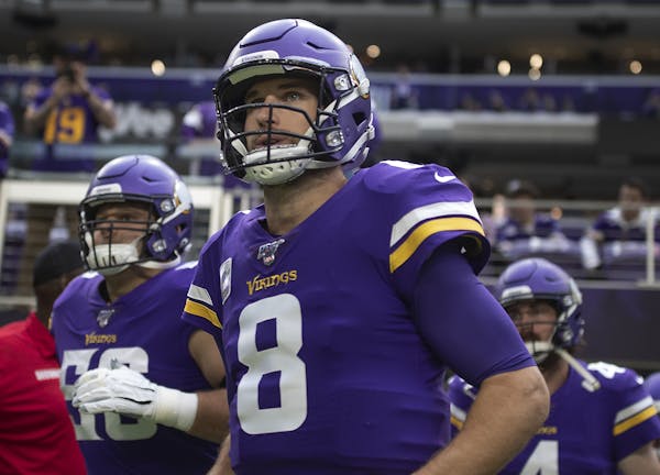 Quarterback Kirk Cousins (8) has a lucrative new contract and a supporting running game. Can he take the offense — and the team — to the next leve