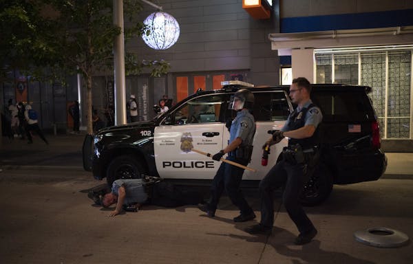 A Minneapolis police officer injured in August's unrest in downtown Minneapolis.