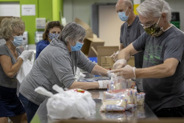 Volunteers worked at the Sheridan Story on Thursday in Roseville. It’s trying to raise $1.8 million for 100,000 weekly meals for students.