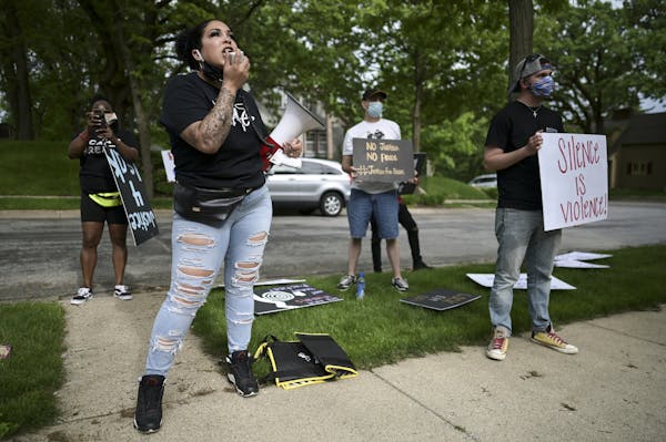 Ashley Quinones protested at Hennepin County Attorney Mike Freeman’s home. Her husband, Brian, was killed by police in 2019.