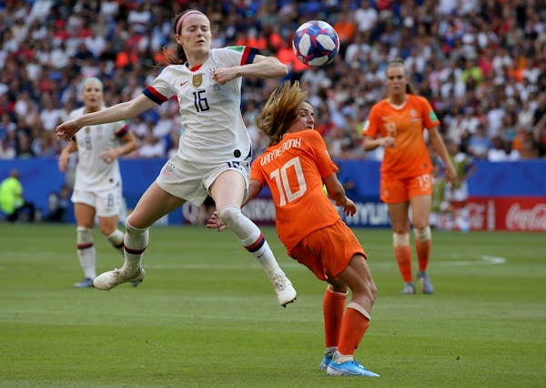 United States' Rose Lavelle, left, is challenged by Netherlands' Danielle Van De Donk during the Women's World Cup final soccer match between US and T