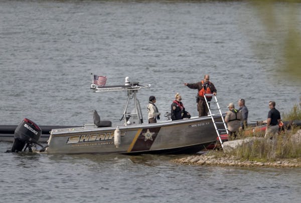 Washington County law enforcement, shown during the search earlier this week for a small airplane that went down in the Mississippi River.