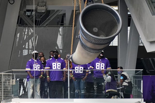 The family of George Floyd stood with the Gjallarhorn before Sunday’s Vikings game against the Packers.