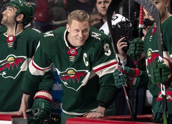 Mikko Koivu watched as his family walked onto the ice Dec. 10 when he was honored for playing in 1,000 NHL games.