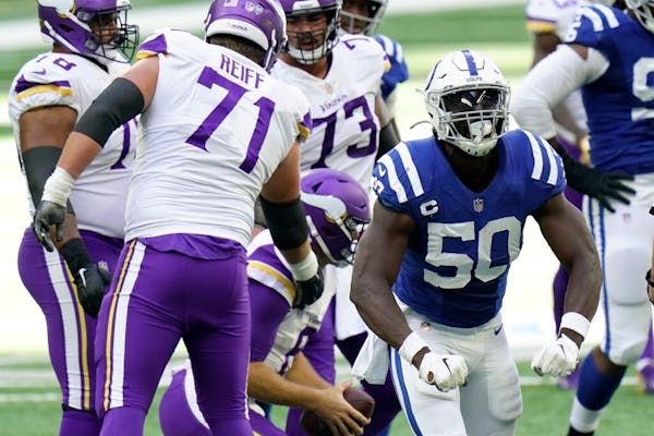 Indianapolis Colts' Justin Houston (50) reacts after sacking Minnesota Vikings quarterback Kirk Cousins (8) during the second half of an NFL football 