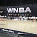 Las Vegas and Connecticut players stood before their semifinal series opener Sunday in the WNBA bubble in Bradenton, Fla. The Lynx and Seattle were al