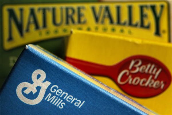 A few dozen people gathered outside General Mills headquarters to protest the company's operation of a plant in an industrial zone in the West Bank.