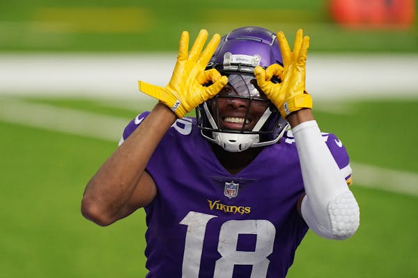 Vikings wide receiver Justin Jefferson celebrating first NFL touchdown on Sunday.