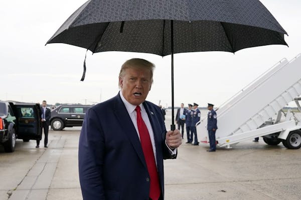 President Donald Trump speaks to reporters at Andrews Air Force Base, Md., as as he returns from campaign stops in Florida and Georgia Friday, Sept. 2