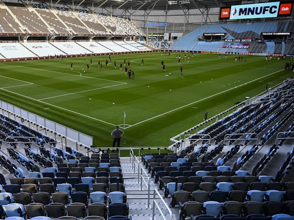 The Loons and Sporting KC warmed up in a mostly empty Allianz Field before a game last month. Fans won’t be allowed for the final six matches there 