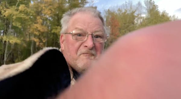 WCCO-TV photojournalist Dymanh Chhoun took video of a man, seen here, confronting a group of Joe Biden supporters gathered near Duluth’s airport.