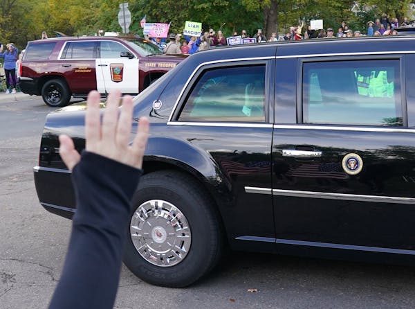 President Trump arrived to supporters and opponents as the motorcade sped through Shorewood, Minn. near the home of Marty Davis, where Trump held a pr