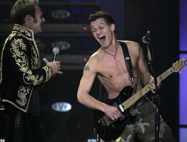 Eddie Van Halen, right, first reunited with David Lee Roth on a tour that came to Target Center in 2007.