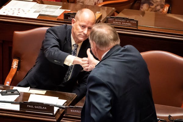 Sen. David Senjem, R-Rochester, the driving force for he bonding bill in the Senate, got a fist bump from Senate Majority Leader Paul Gazelka, R-East 