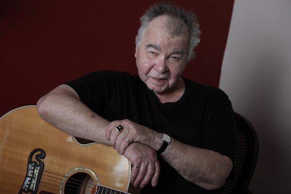 John Prine recorded "When I Get to Heaven" with his grandson and Brandi Carlile, among others, on kazoo. Associated Press