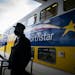 Conductor Mike Szabla stood outside the train prior to departure on the Northstar commuter train at Target Field station in Minneapolis.